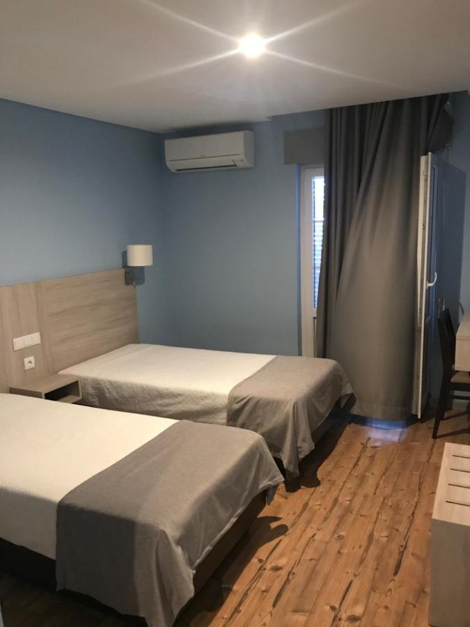 Tweepersoonskamer met 2 Aparte Bedden