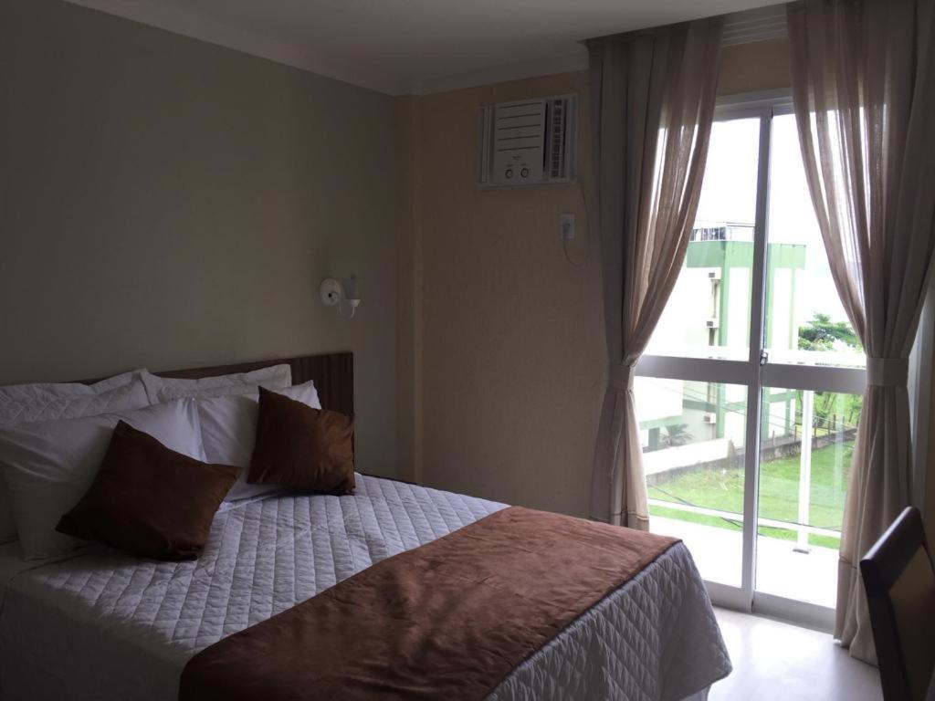 Quarto Triplo com Varanda