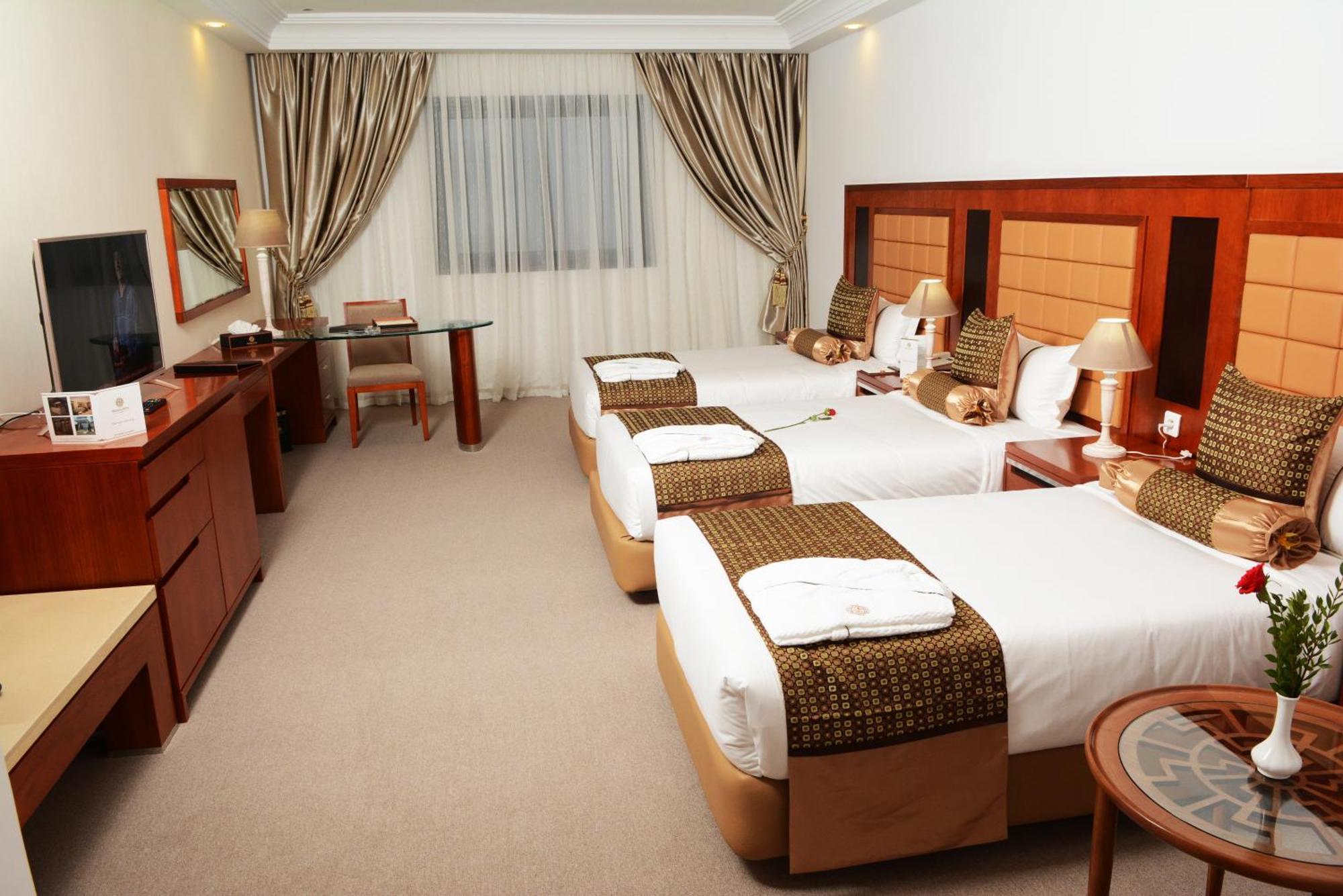Deluxe Triple Room