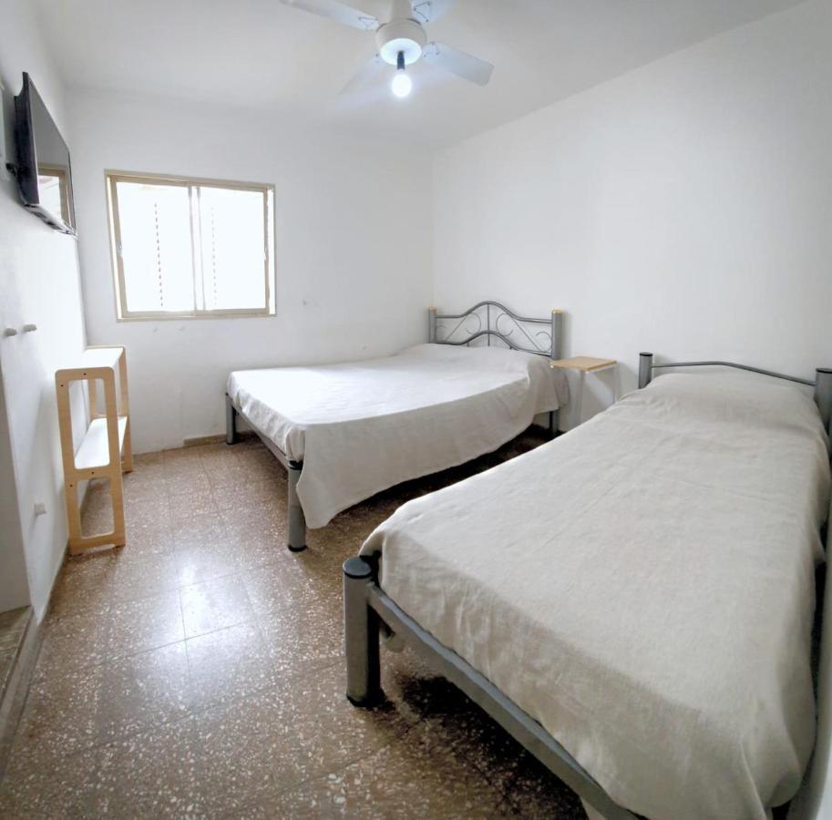 Habitación Triple con vistas al jardín