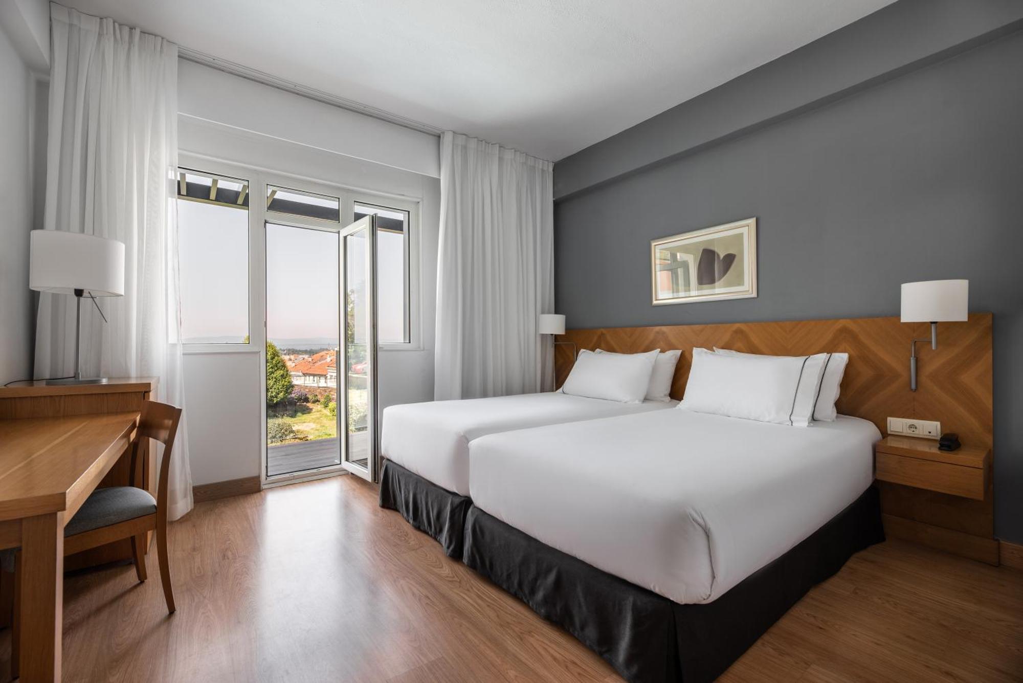Luxe Kamer met 1 of 2 Bedden en Balkon