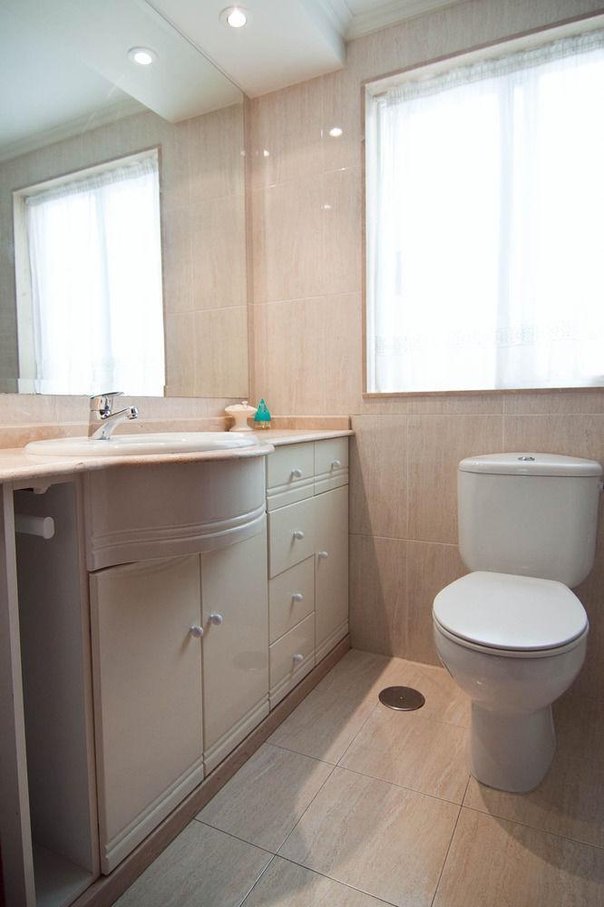 Habitación individual básica con baño compartido