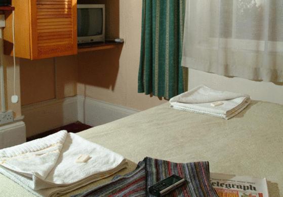 Chambre Simple Basique avec Salle de Bains Commune