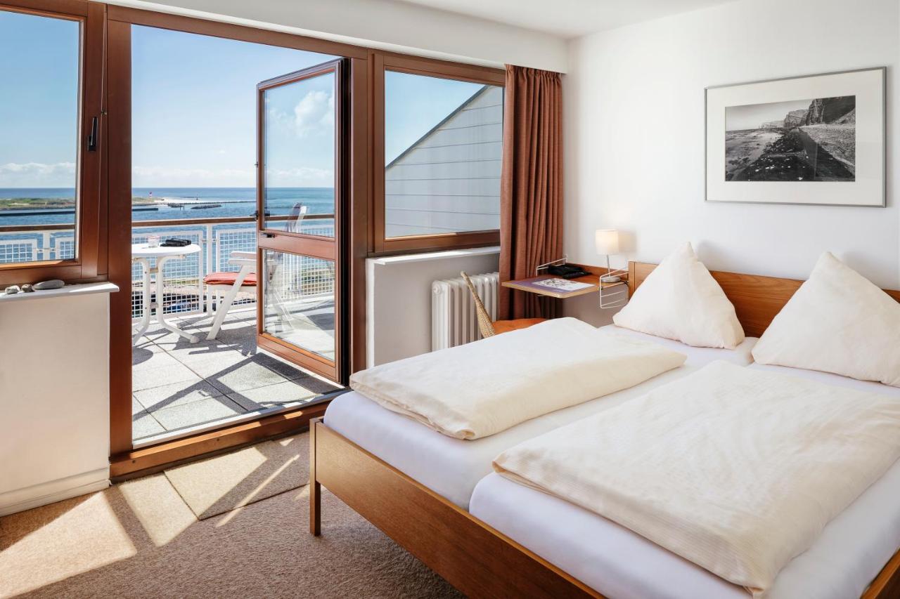 Doppelzimmer mit Balkon und Meerblick