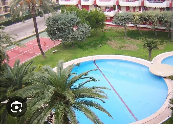 Acogedor apartamento en Daimús a 150 metros de la playa con parking privado y piscinas comunitarias