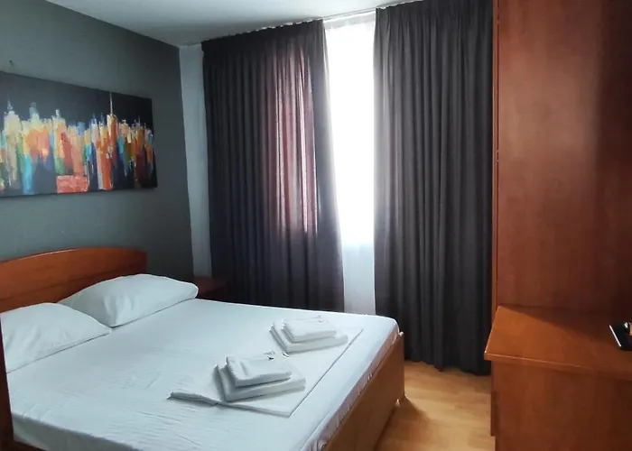 Grand - Beachfront Rooms & Apartments