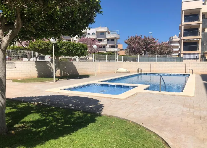 Fantastico bajo con Jardin en Playa de Canet