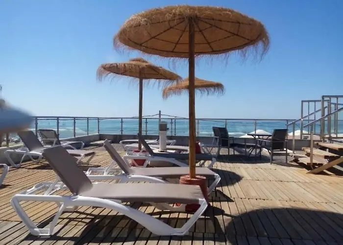 Islantilla-Apartamento con piscina y garaje en primera línea de playa