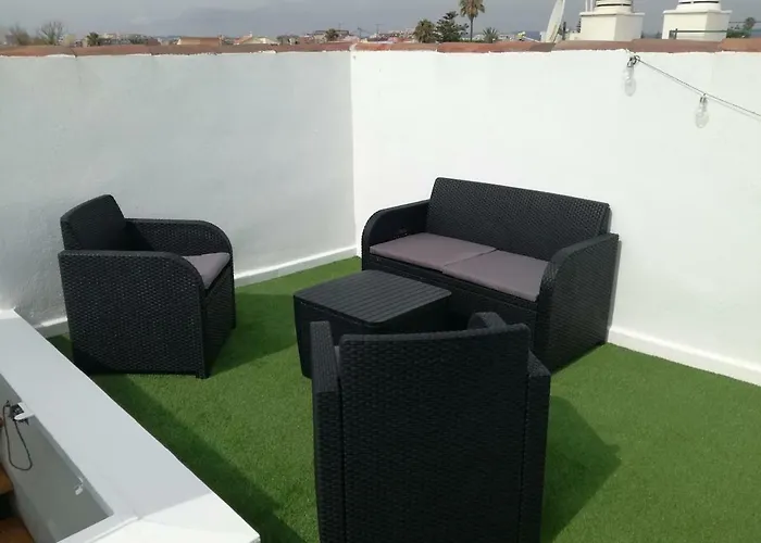 Apartamento con terraza privada y piscinas